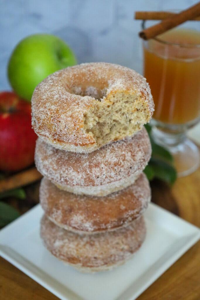 Baked Gluten Free Apple Cider Doughnuts with a bite