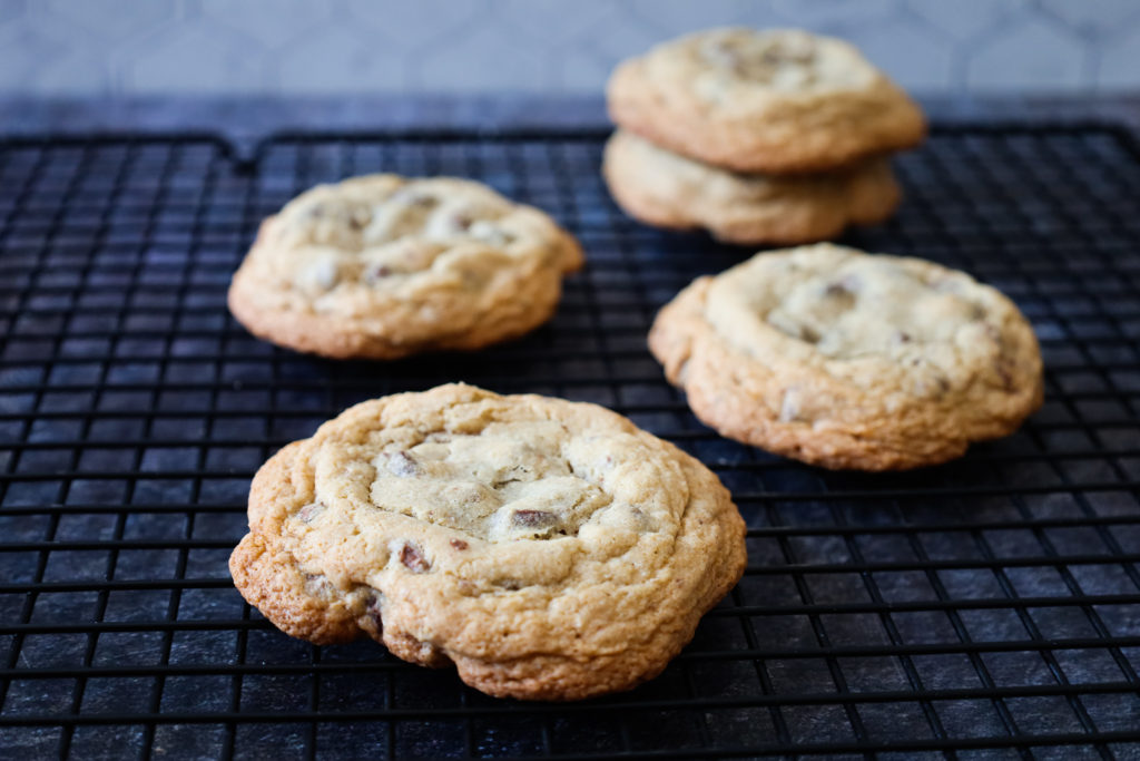 The best recipe for gluten free chocolate chip cookies cooking on rack
