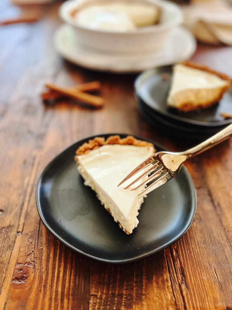 a slice of gluten free cheesecake on a plate