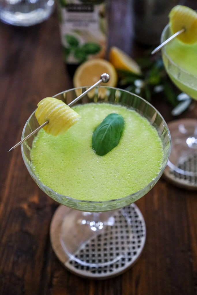 Oliveto Cocktail garnished with a lemon cheek